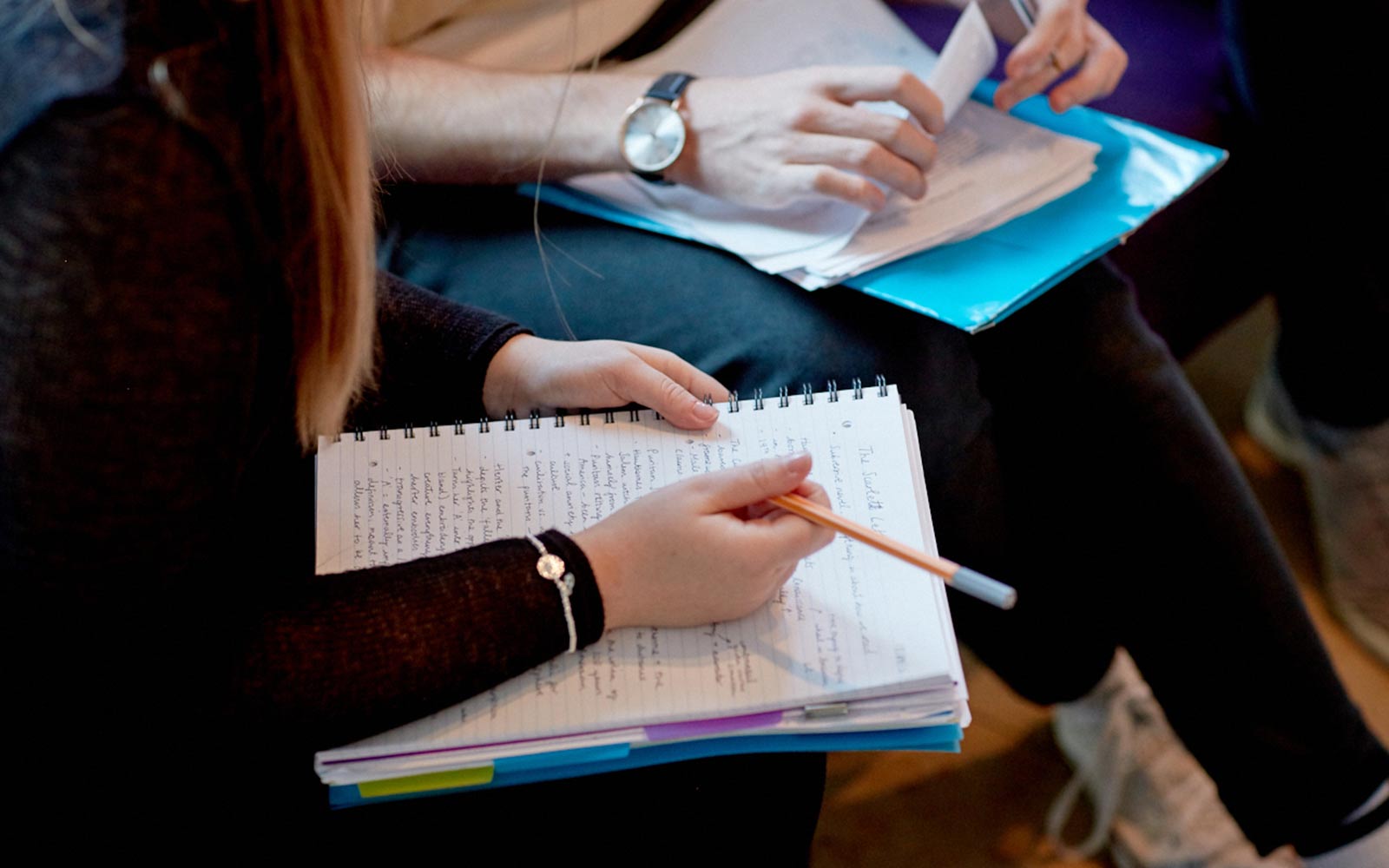 geography media student writing notes