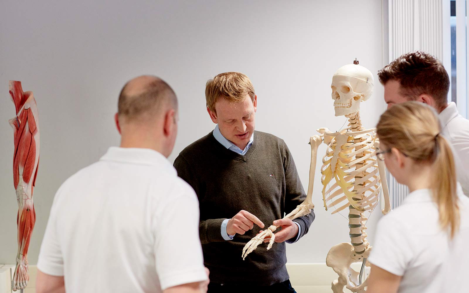Physiotherapy students with lecturer