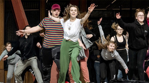 Students dancing outside.