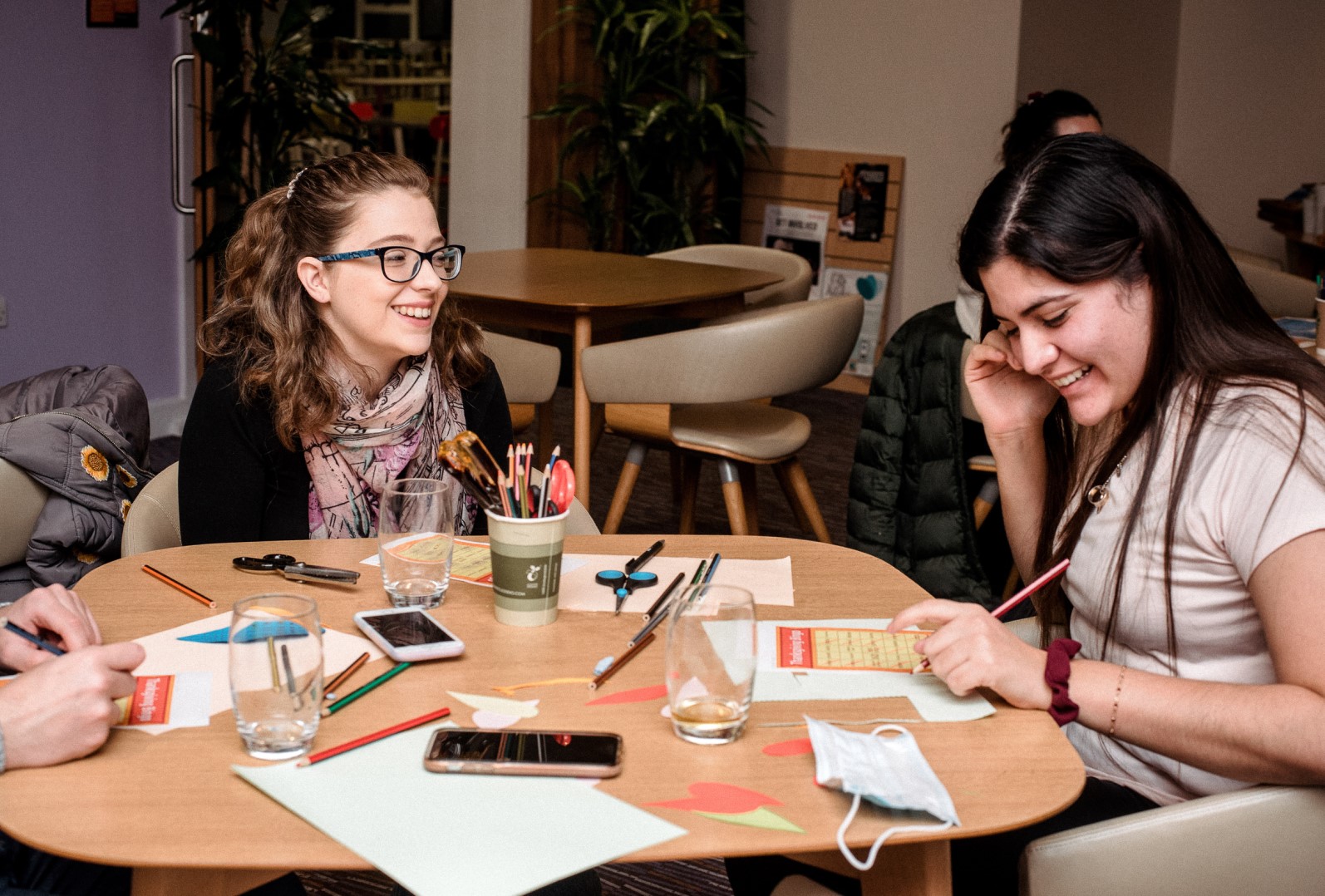 Students doing craft at table