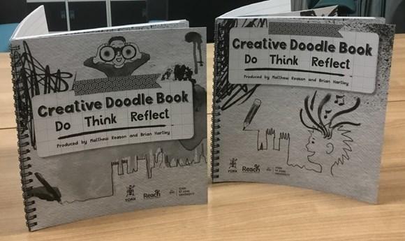 front cover of two creative doodle books for children
