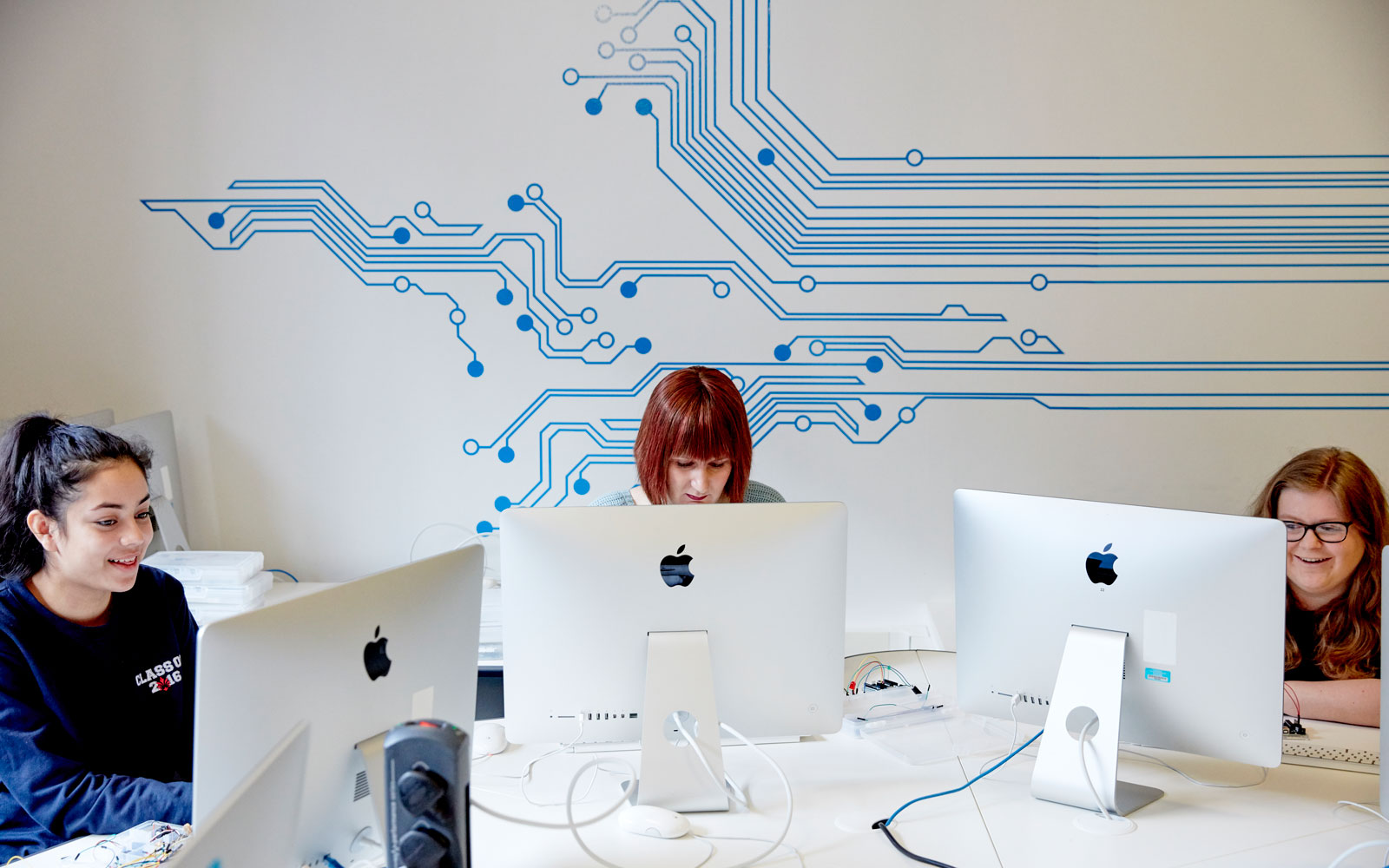 Students working in a mac