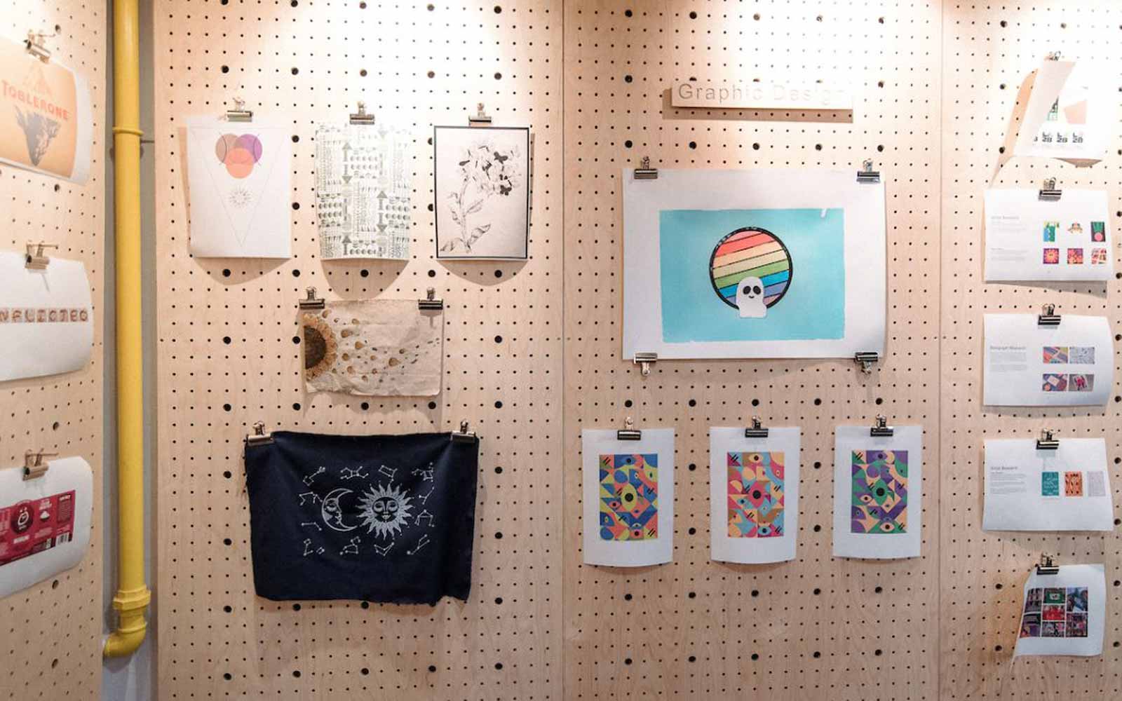 A wooden board featuring different prints.