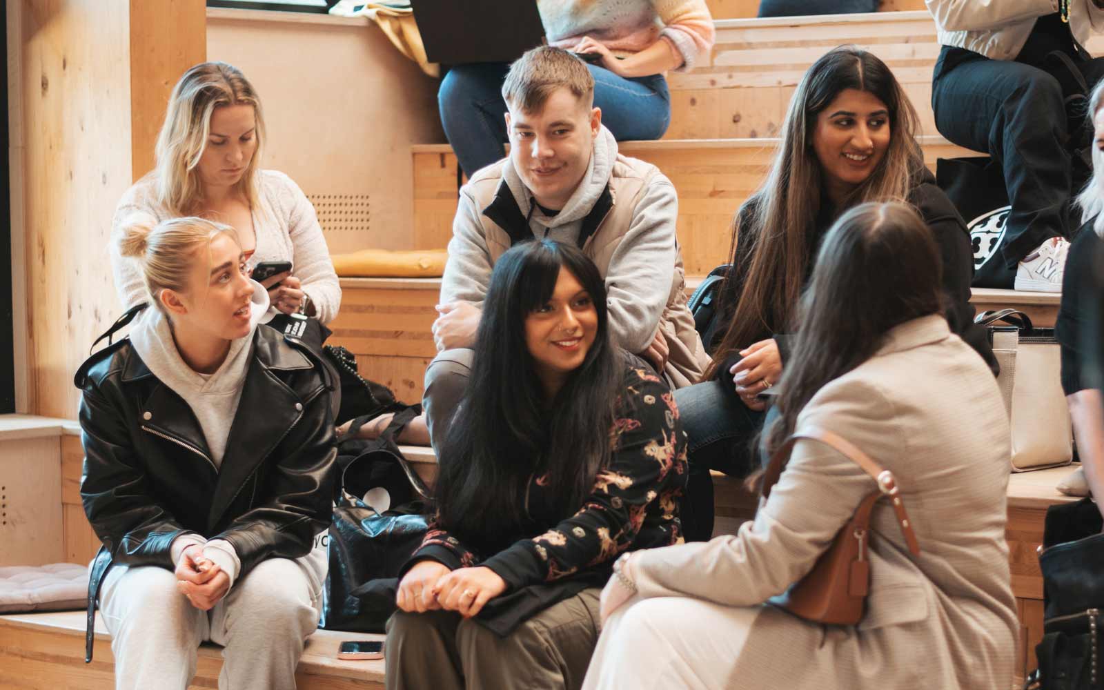 A group of students talking together.