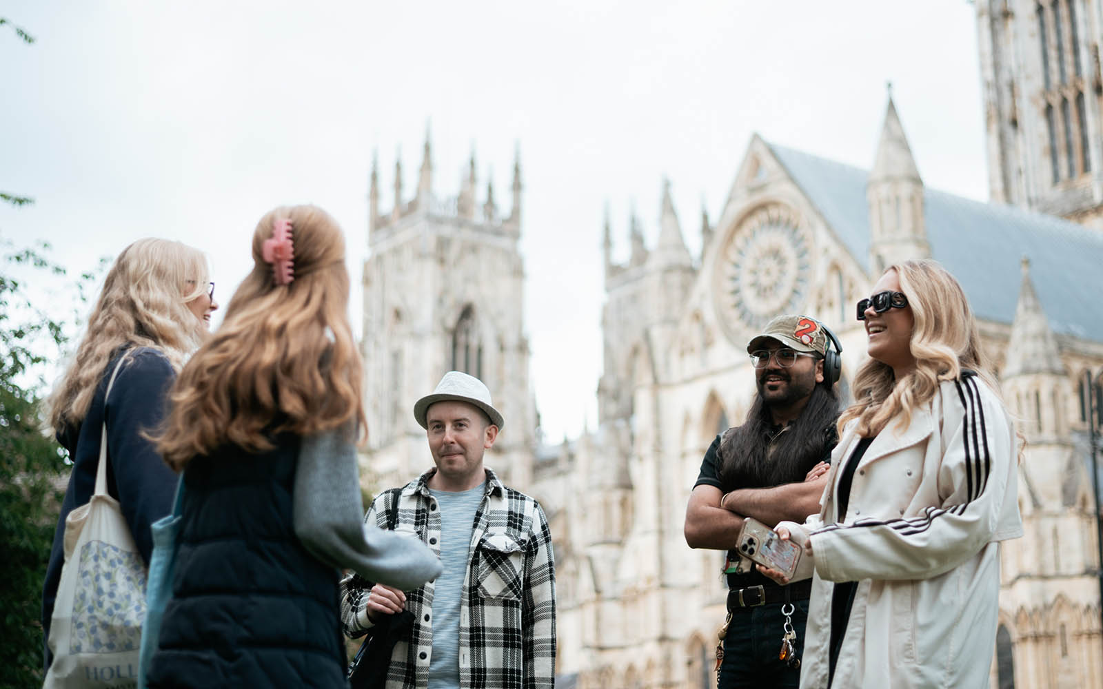 Group of students chatting in front of York Minster