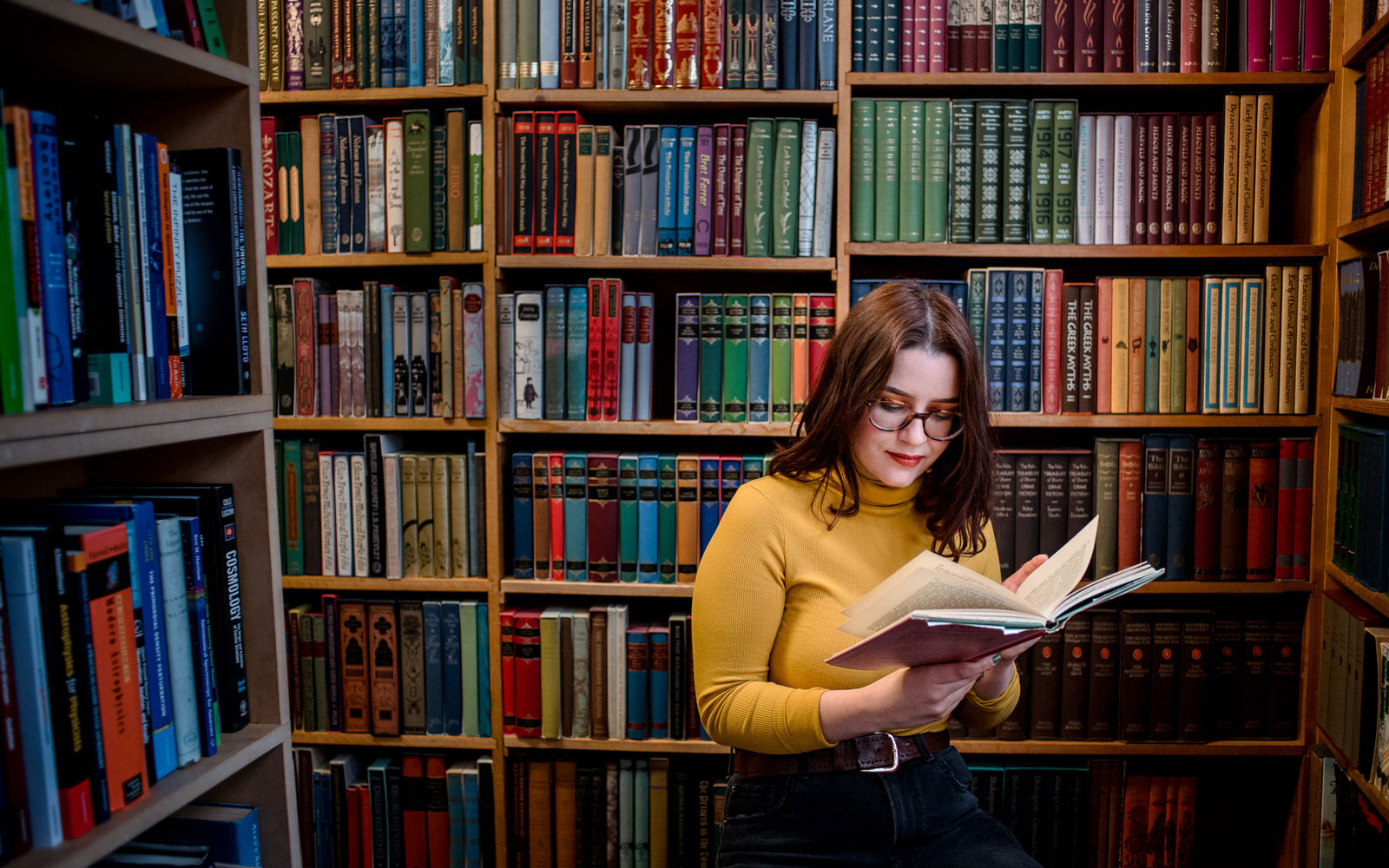 Student reading in the library