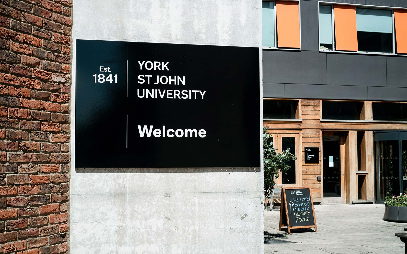 Welcome sign at entrance to York St John campus
