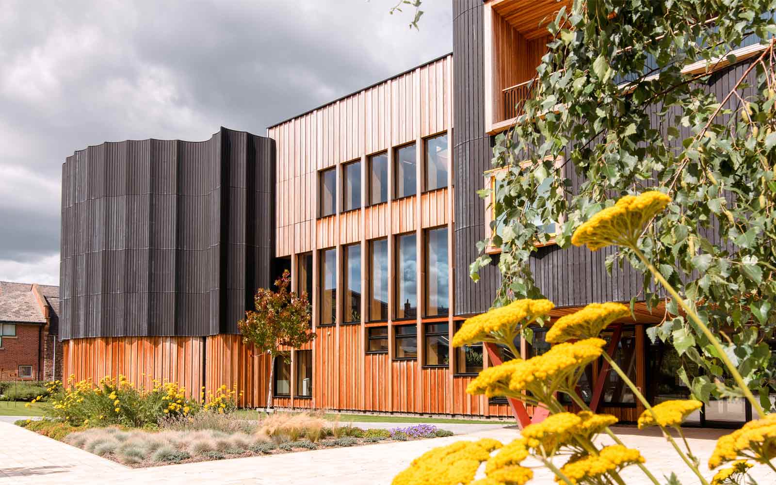 Creative Centre exterior with flowers in foreground