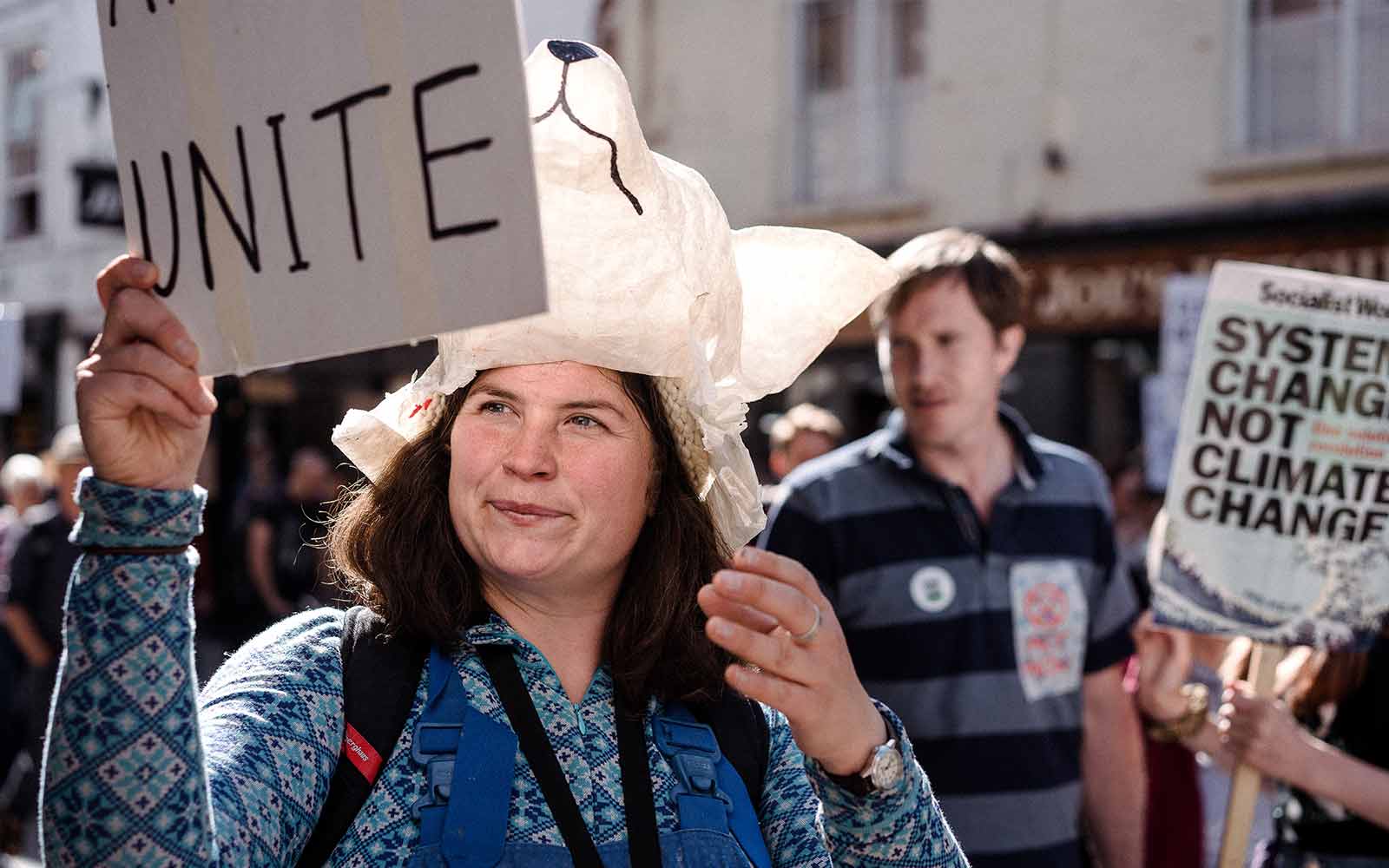 Woman holding a poster at the York climate strike.