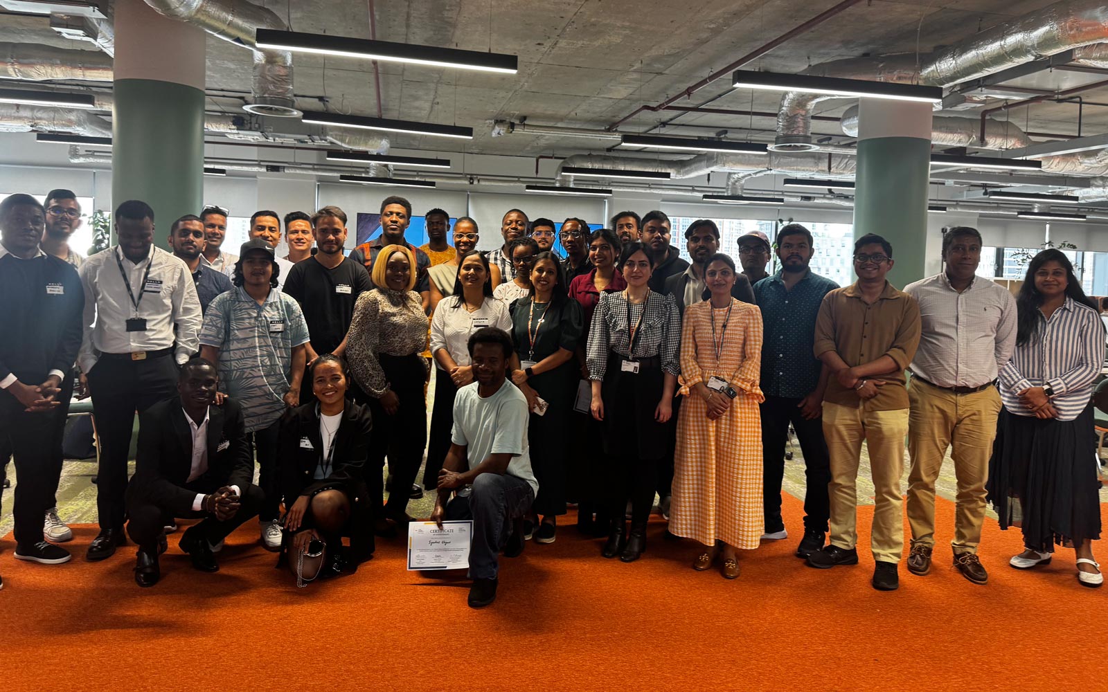 Full group photo taken at the Explore, Present and Network event