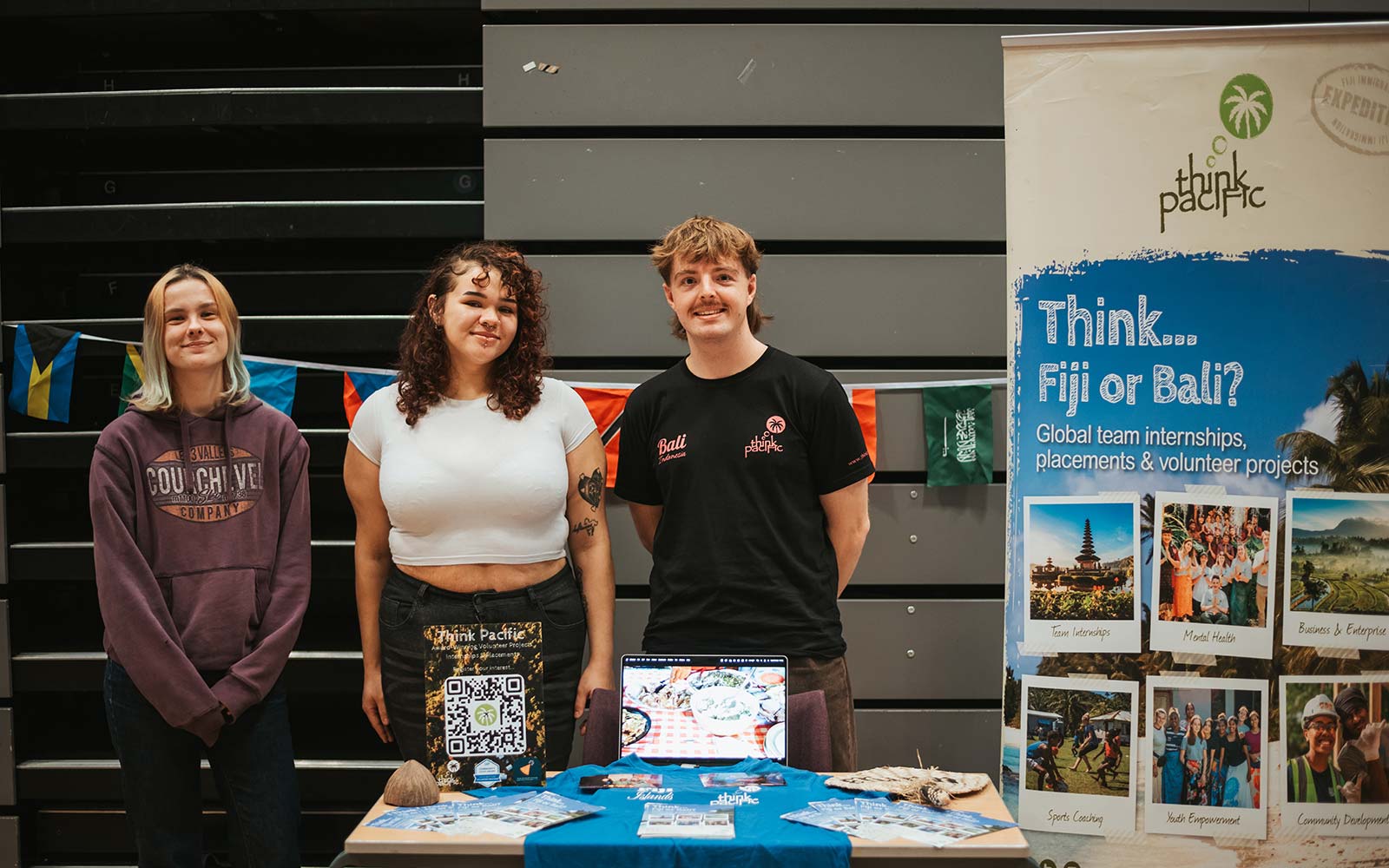 Think Pacific staff stood behind stall at Global Opportunities Fair