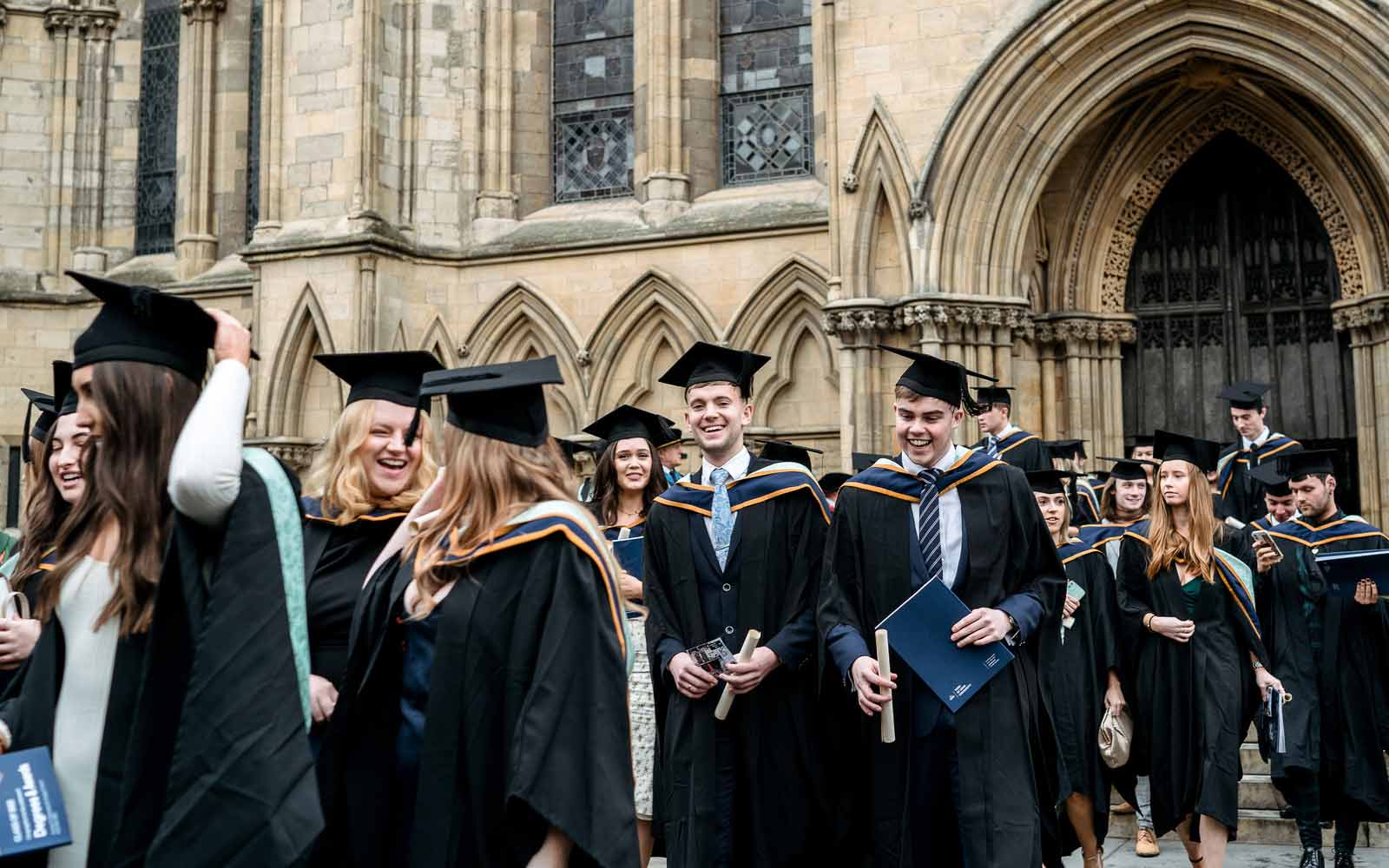Students outside York Minster at graduation.