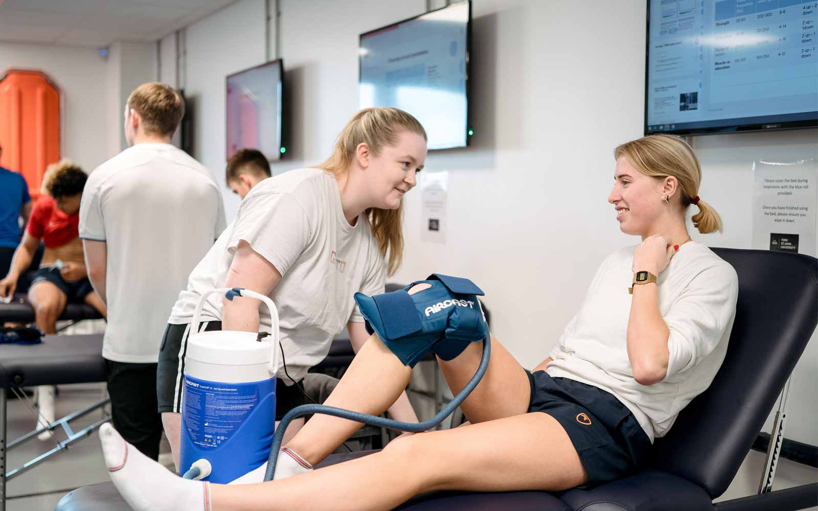 Sports therapy students working in the injury clinic.