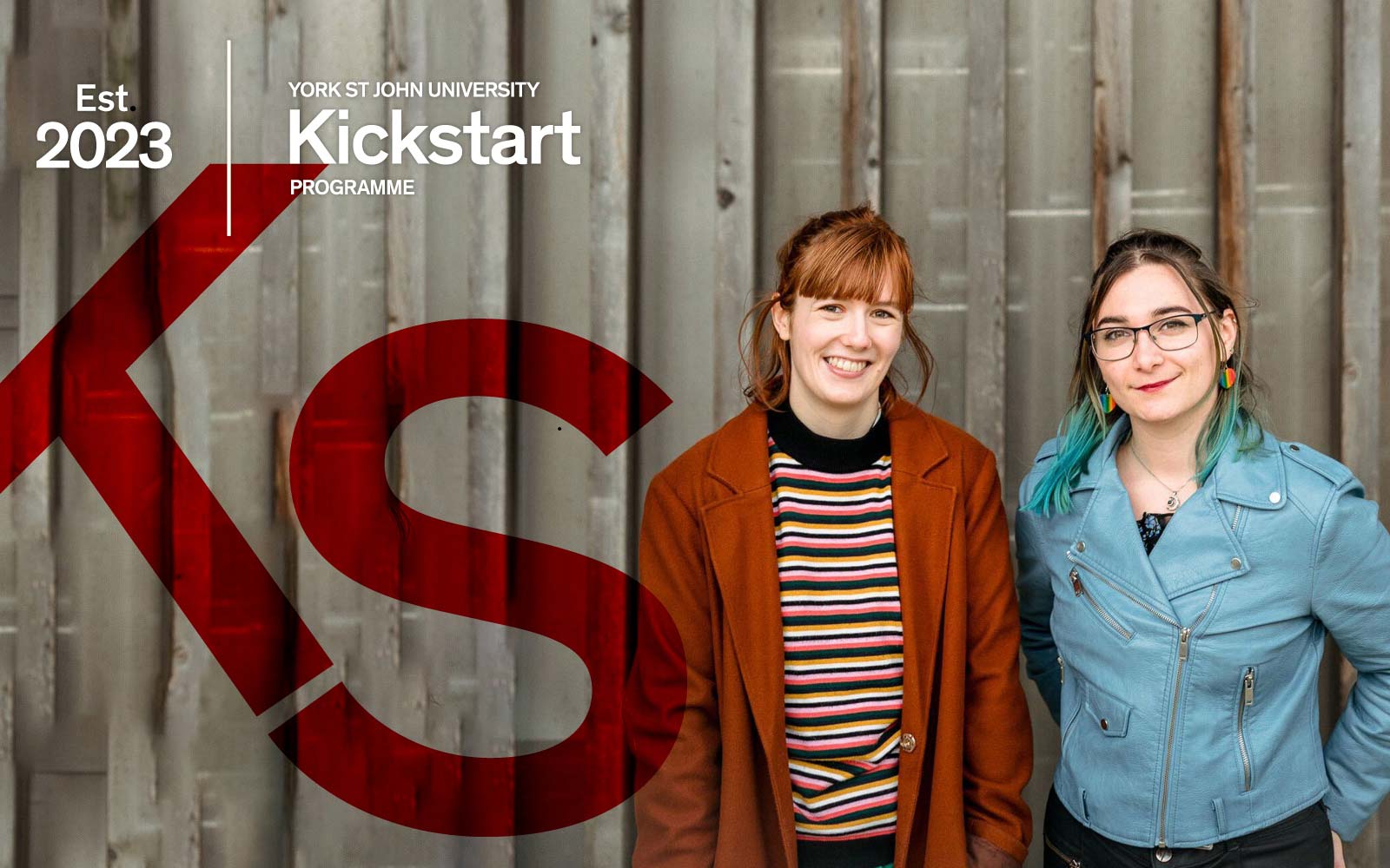 Students smiling with Kickstart Programme logo and branding