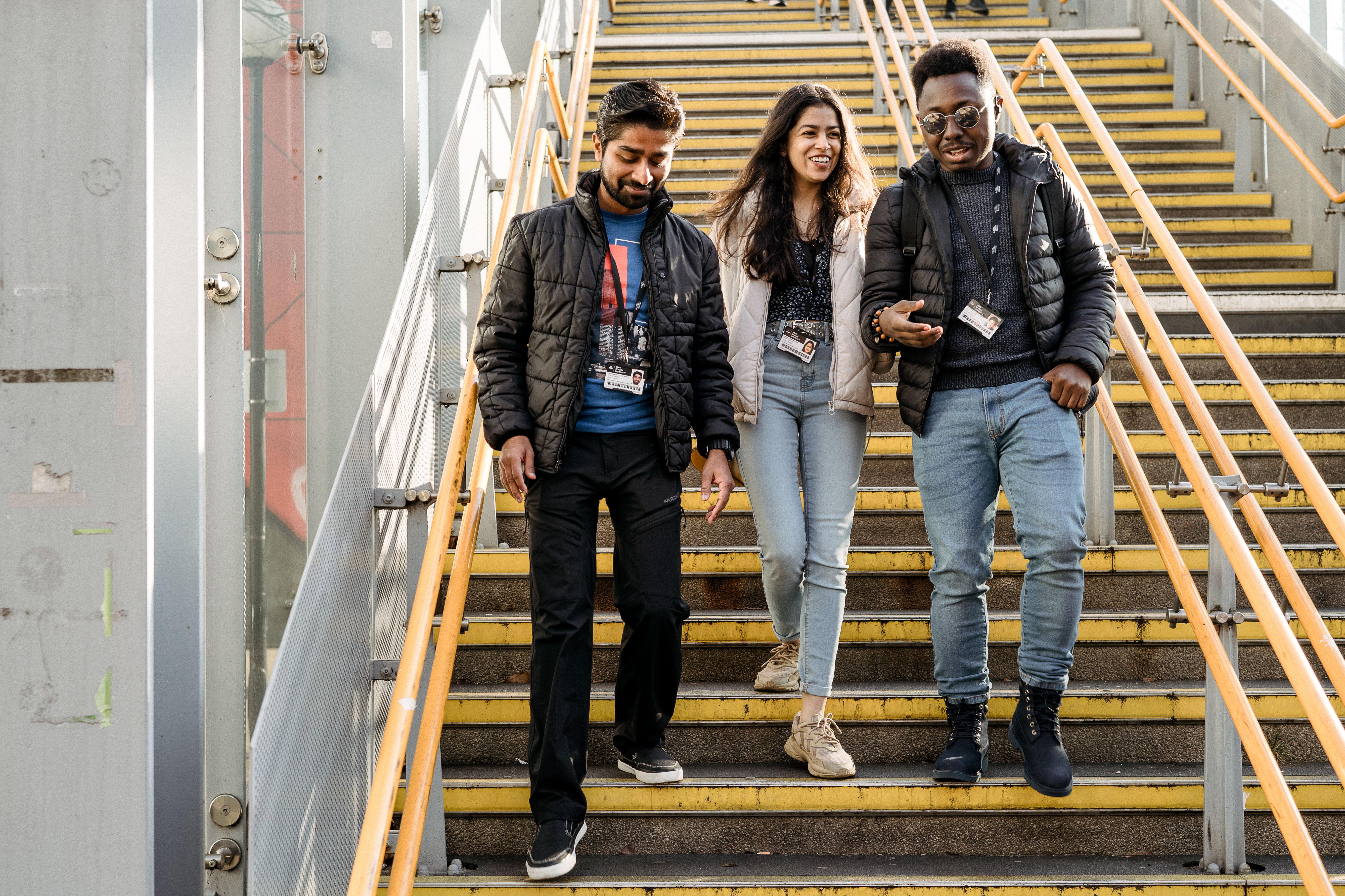 Students walking down stairs