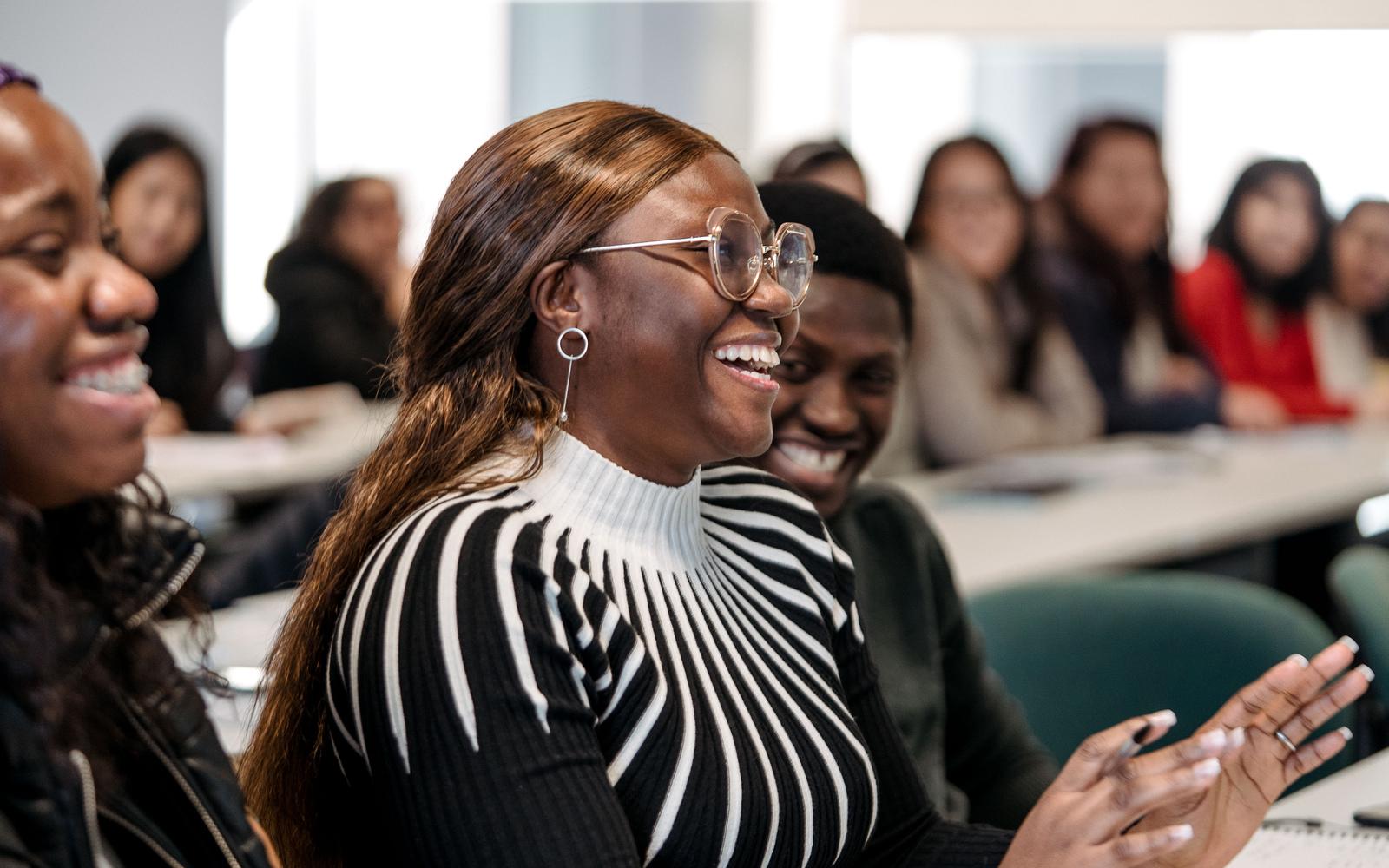 Student smiling in classroom