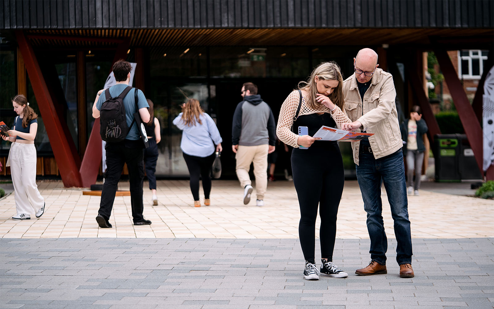 Parent and child looking at map at Open Day