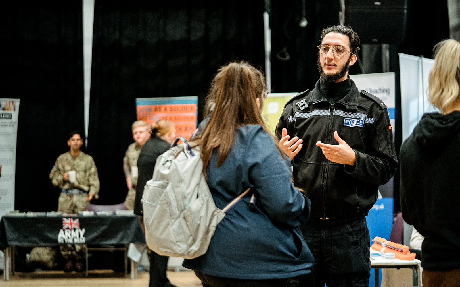 Student talking to the police at a Career Event