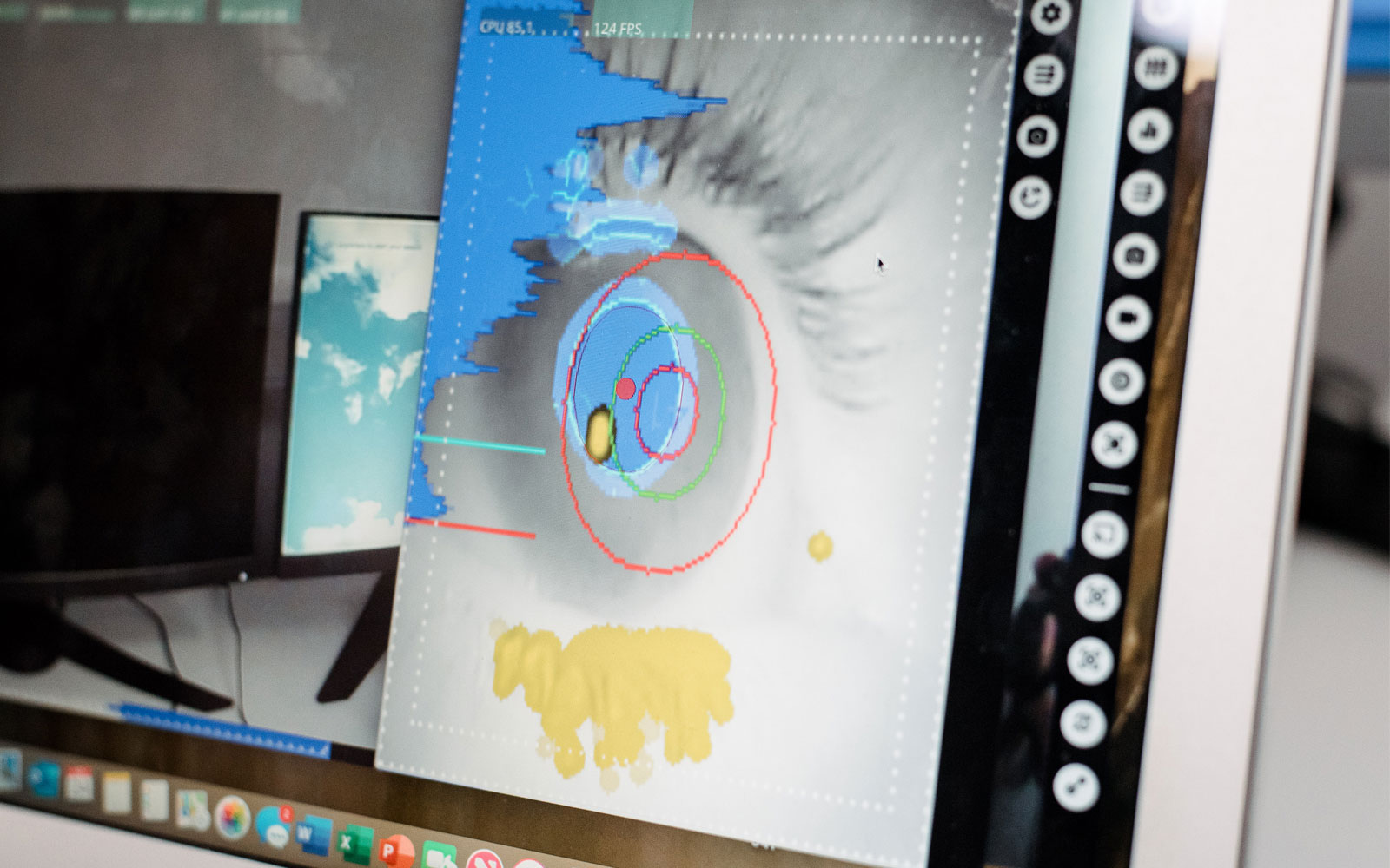 Computer screen displaying psychology software analysing eye movement