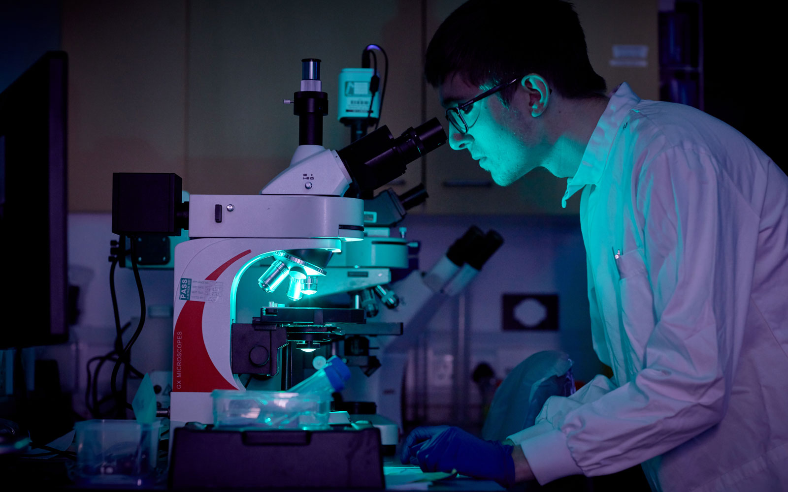 Student using a microscope