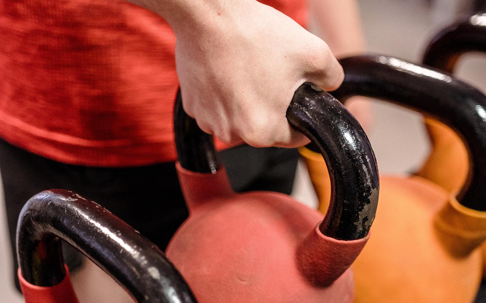 Hand lifting kettlebell