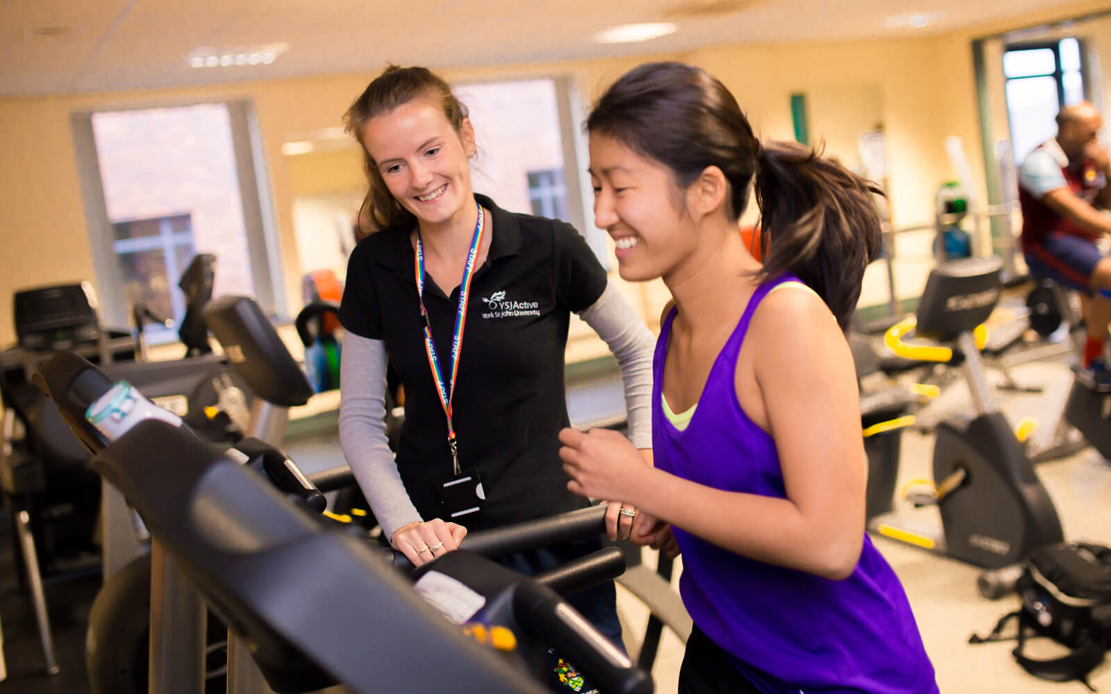 YSJ Active member of staff helping in gym