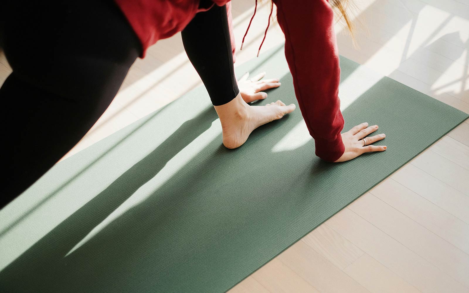Person lunging on yoga mat