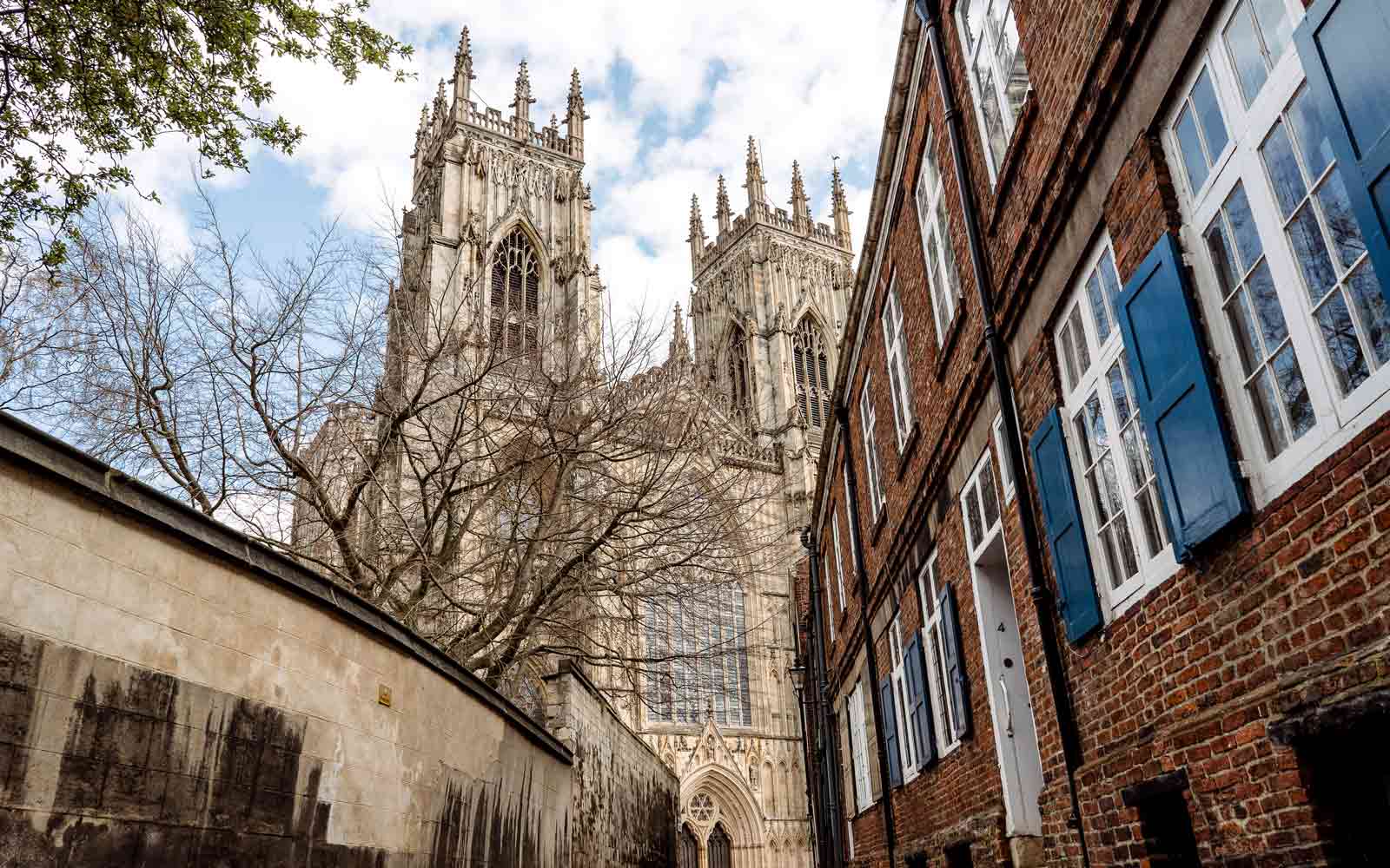 Looking up at the front of York Minster from a nearby street.