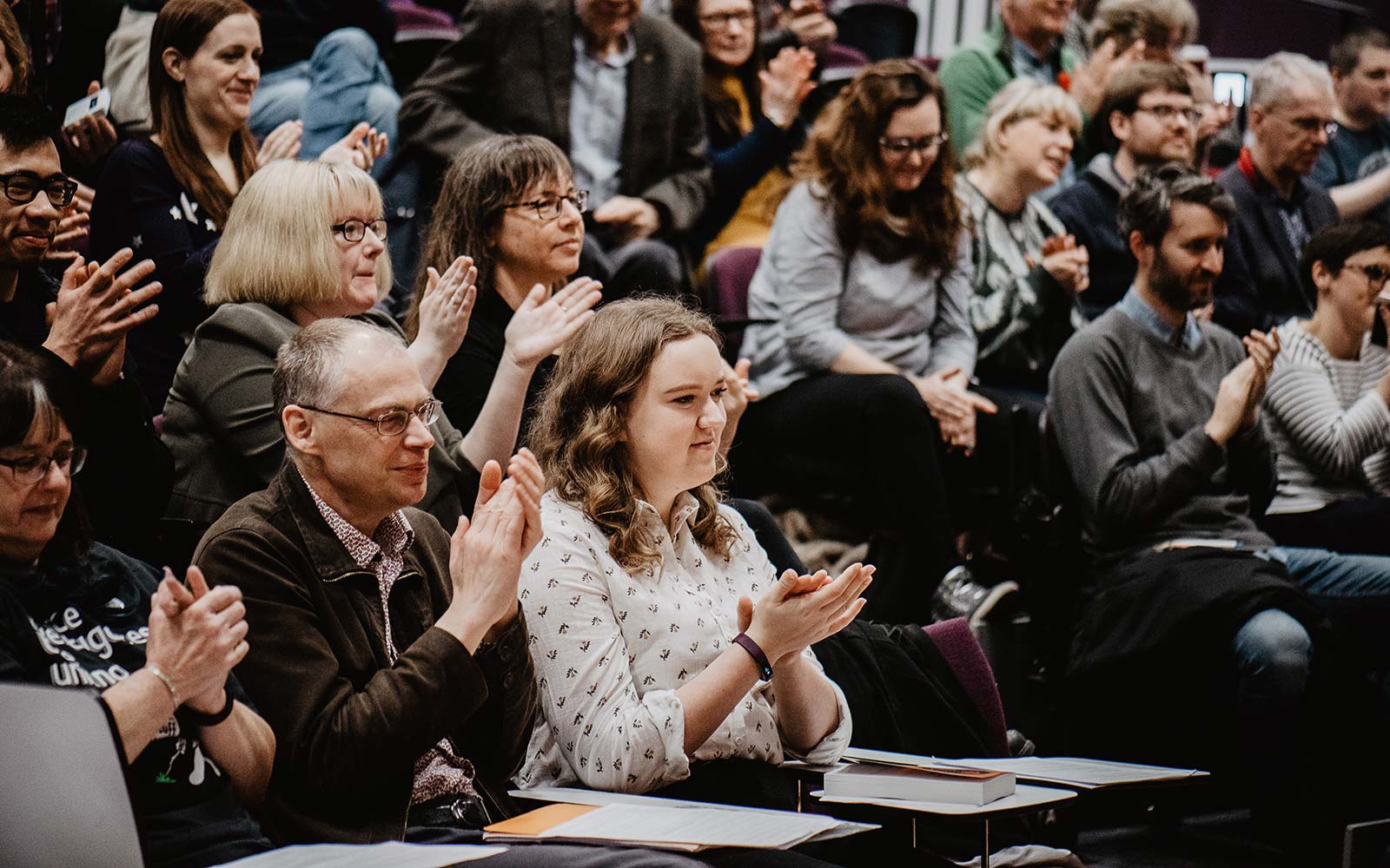 People sitting in a lecture hall at the Literacy Festival