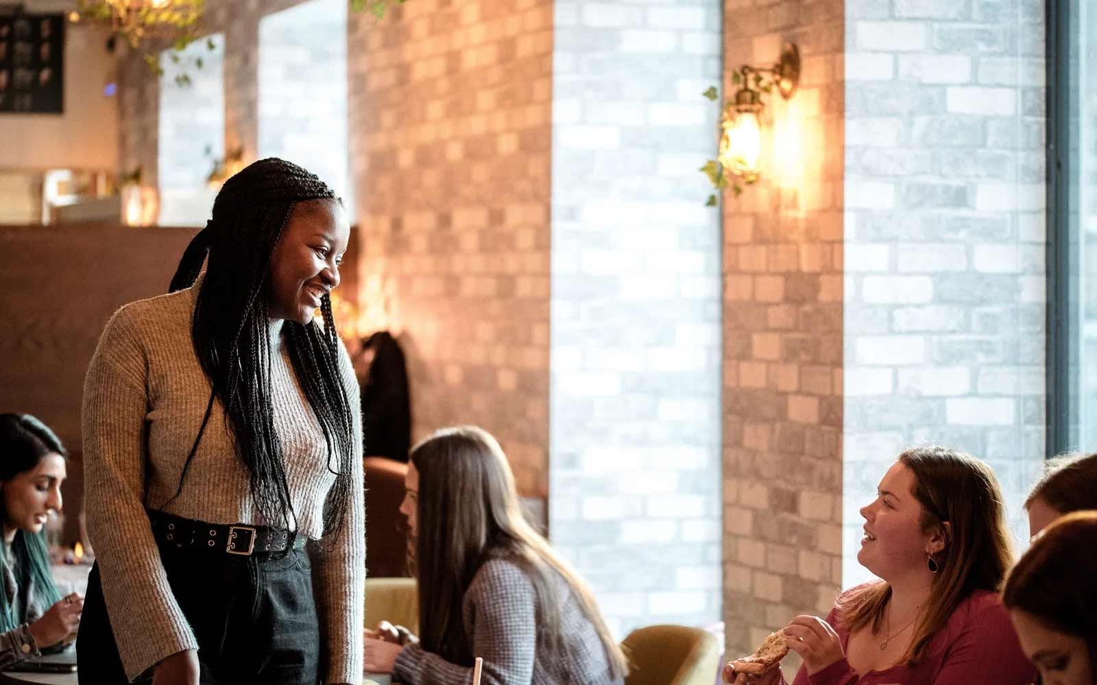 Students talking at a Students' Union social.