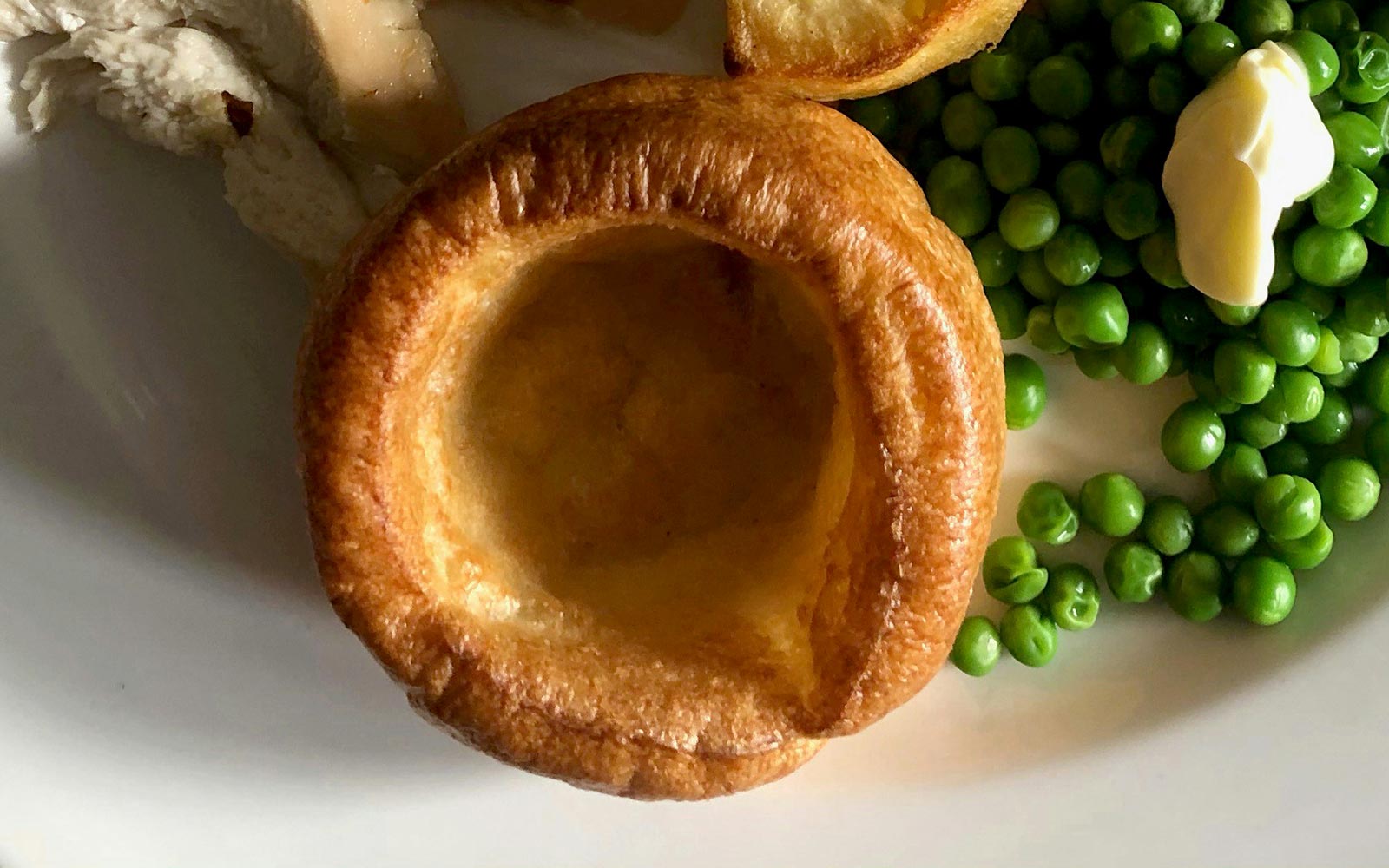 Yorkshire pudding on a plate of roast dinner