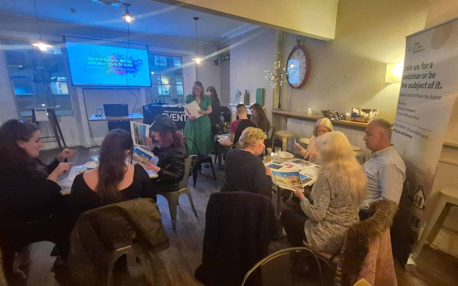 A group of people sitting together at an event.