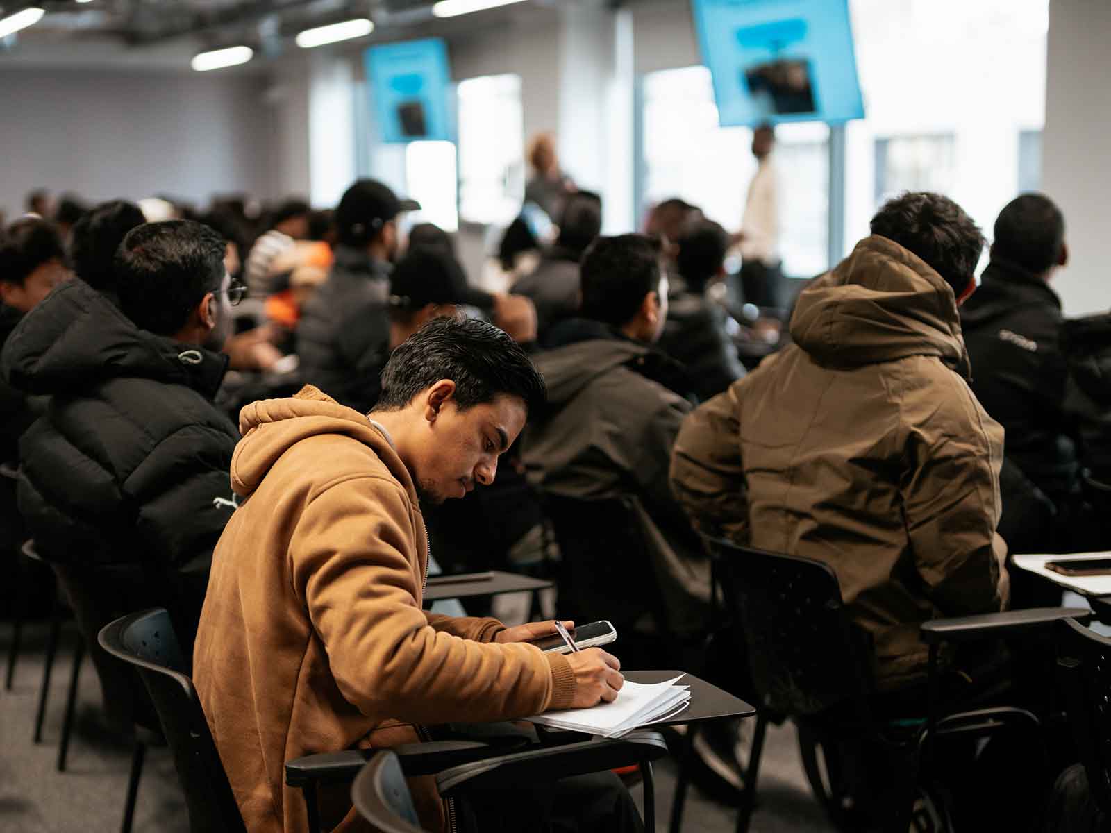 A student working in a classroom on our London campus