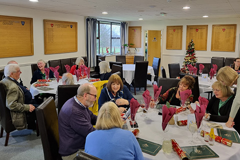 Alumni sat at tables for the alumni Ripon Christmas event 2024