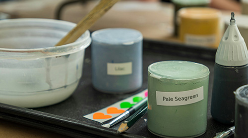 Paints and tools for pottery painting