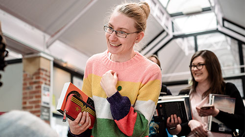 Student queueing for book signing