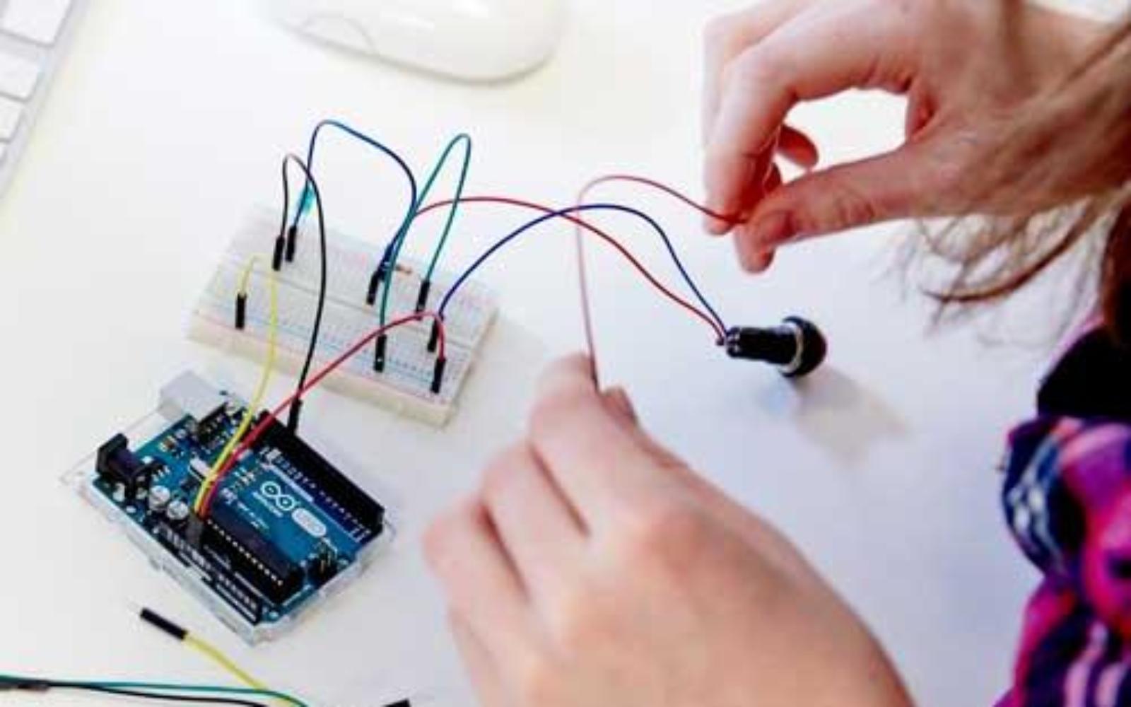 Student working with electronics