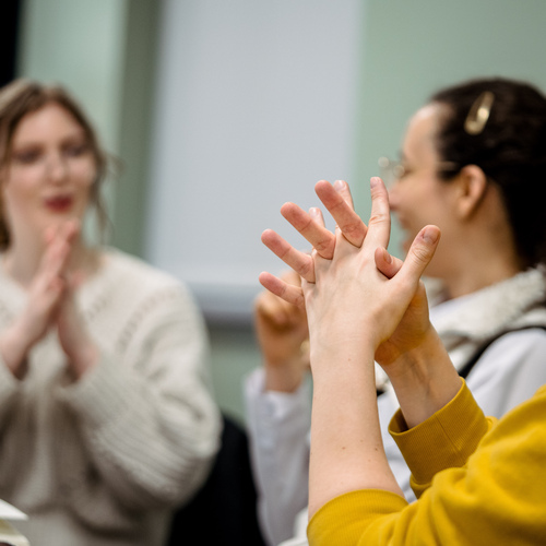 Close up of hands signing during BSL seminar