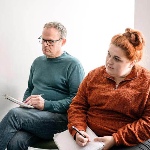 Counselling students taking notes