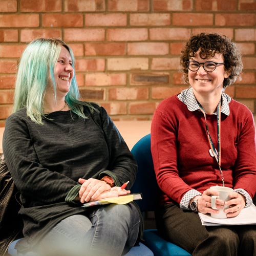 Staff sitting in seminar for International Women's Day 2020