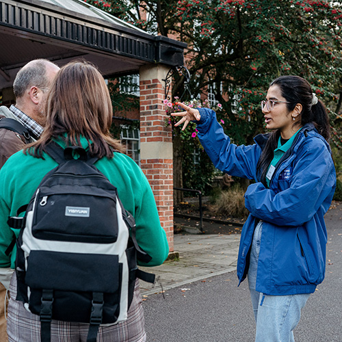 Student Ambassador showing family around campus