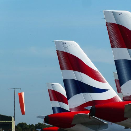 Back of some planes at an airport