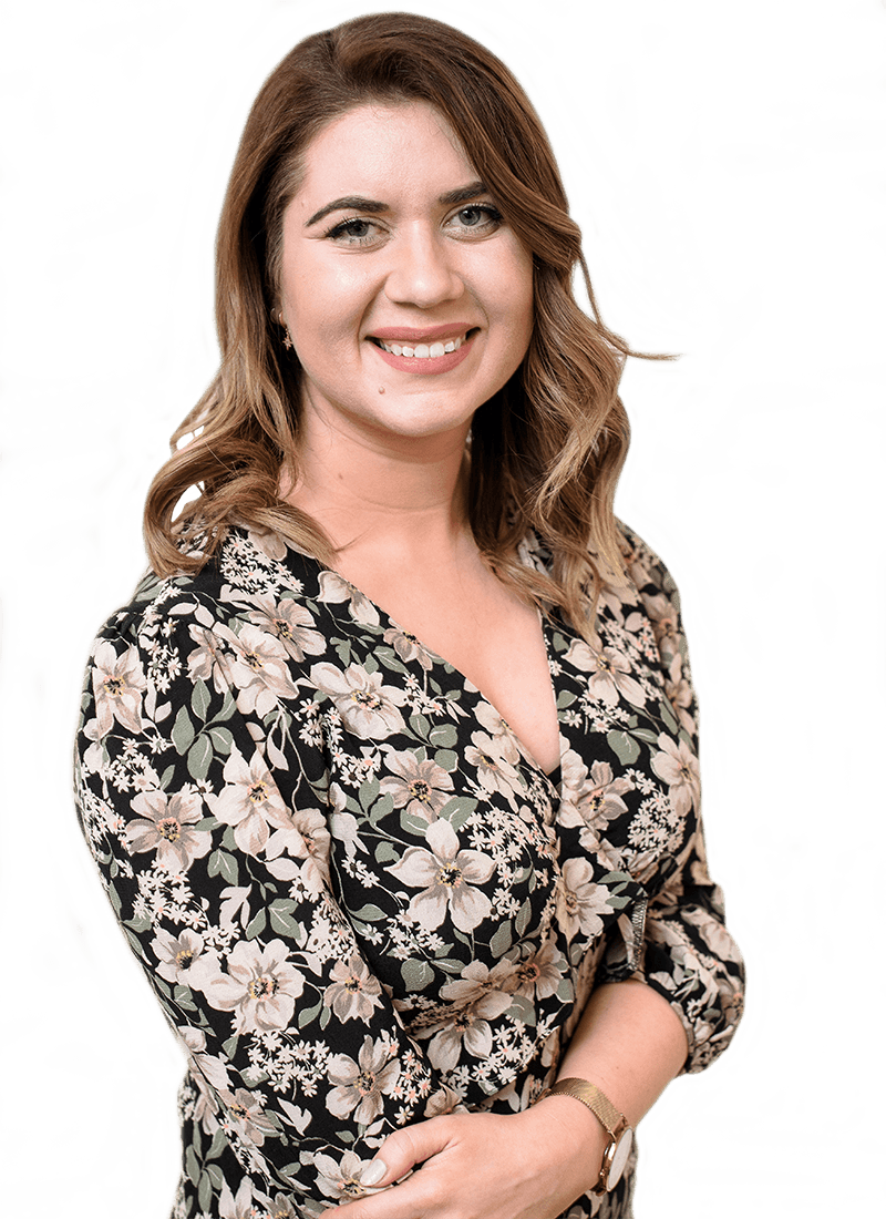 A portrait of Eleanor, Head of Admissions, smiling