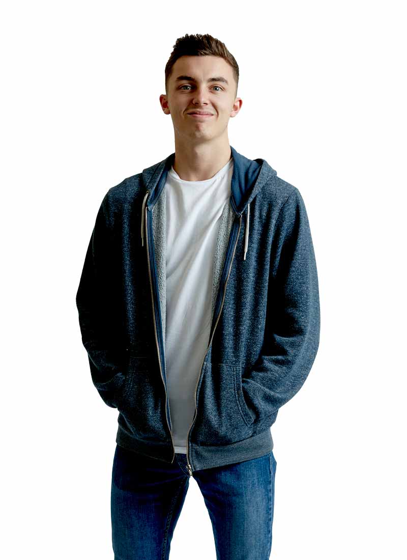 Male student smiling to the camera.