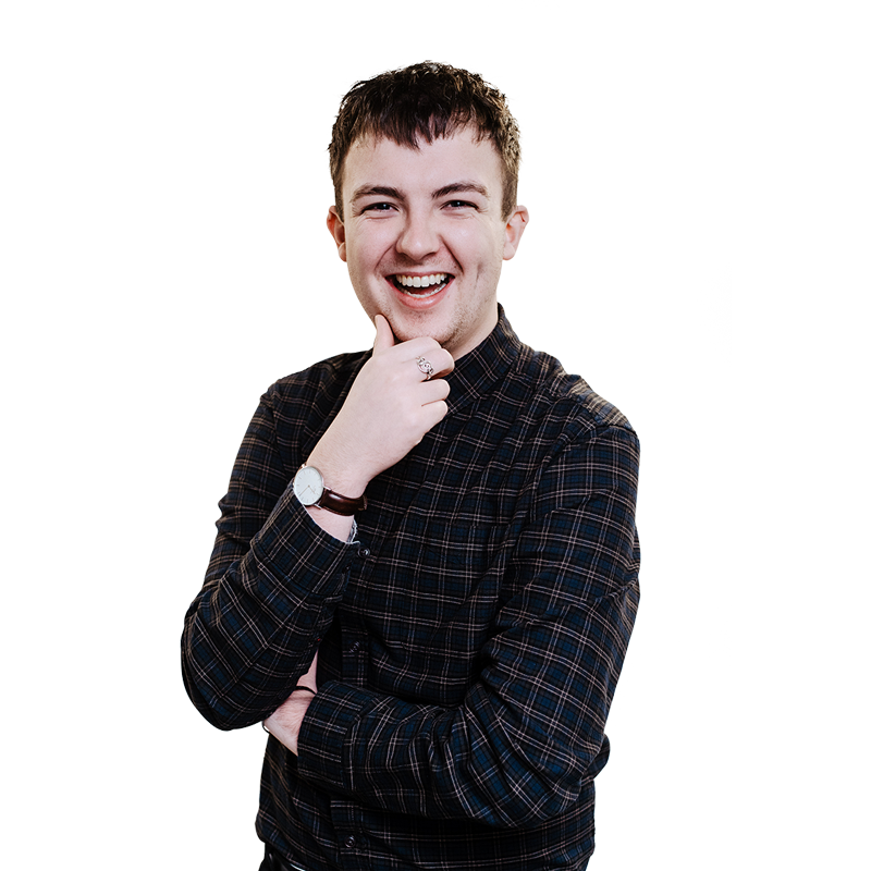 An image of Alex Manson smiling