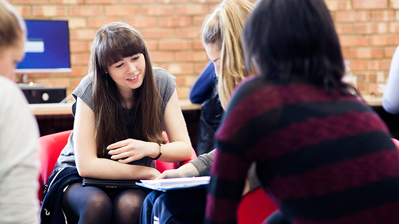 Students working in library