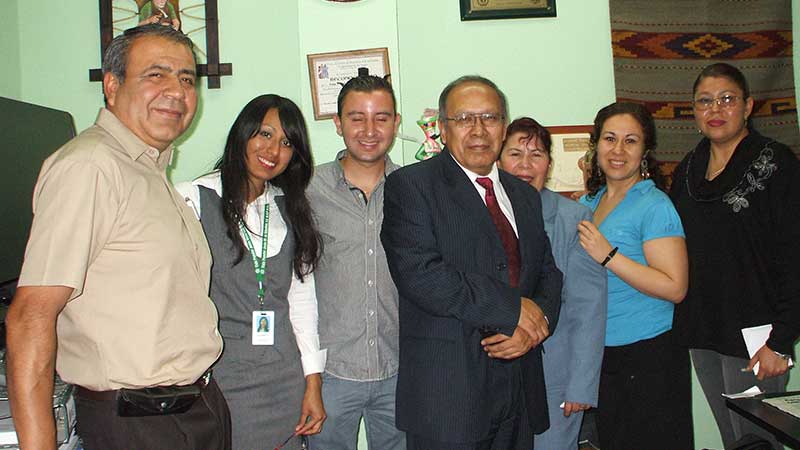 Member of cooperative bank Jesus meza Sanchez standing in a group