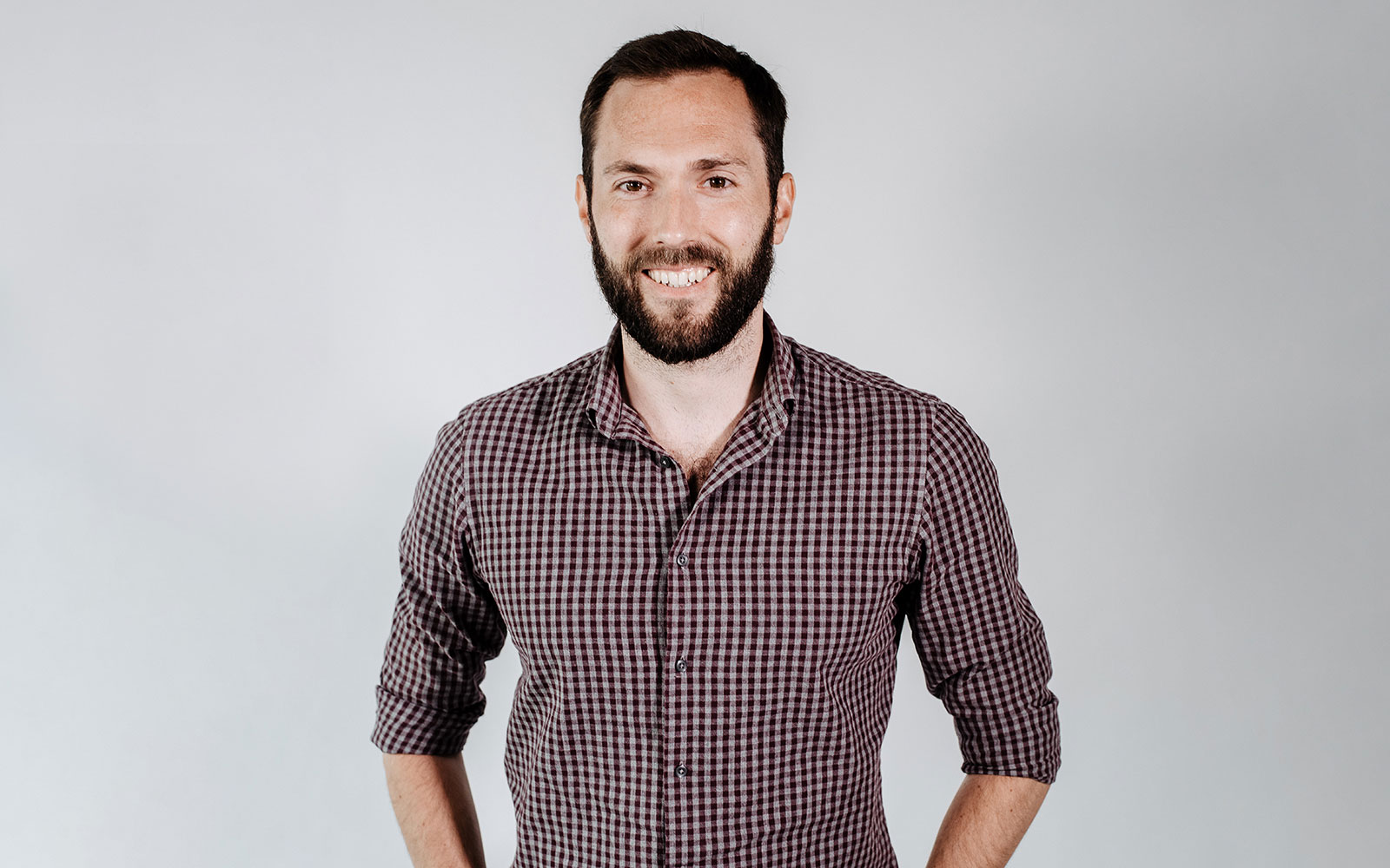 A staff profile image of Daniel Madigan