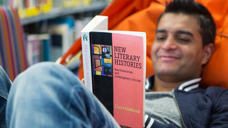 Student reading History of Literature book